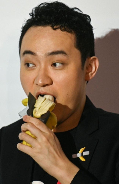 Crypto entrepreneur Justin Sun eats banana art he bought for $9.5 million