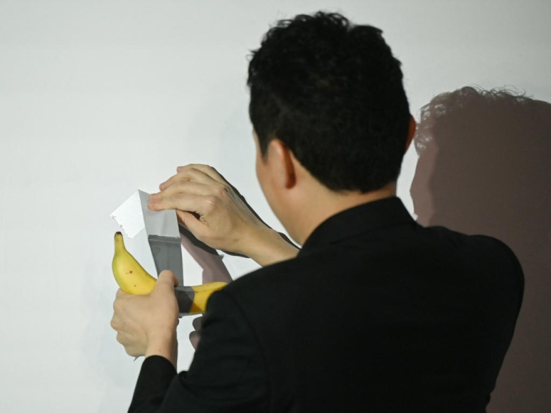 Crypto entrepreneur Justin Sun eats banana art he bought for $9.5 million