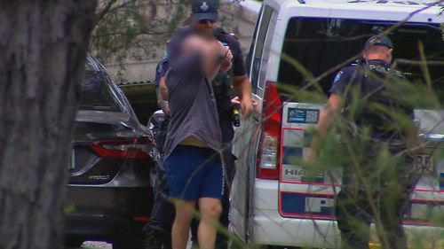 Video footage shows a teenager and two men being arrested after a six-hour manhunt that saw a Gold Coast suburb put on lockdown