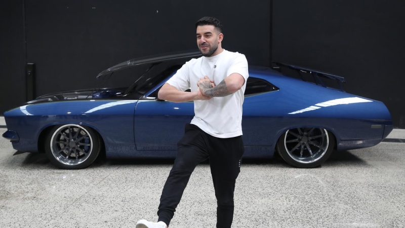 Lambo guy Adrian Portelli hands out Coles vouchers