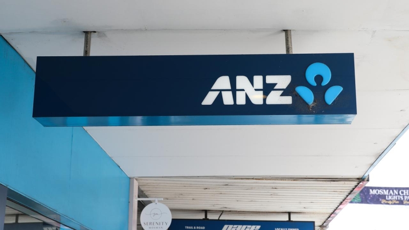 Protesters clash with ANZ over its climate and military funding