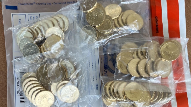 Third person charged with stealing 63,000 unreleased limited edition $1 Bluey coins in Sydney